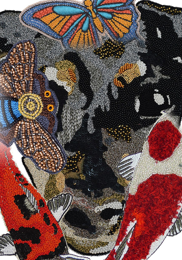 HANDEMBROIDERED MOTIF 